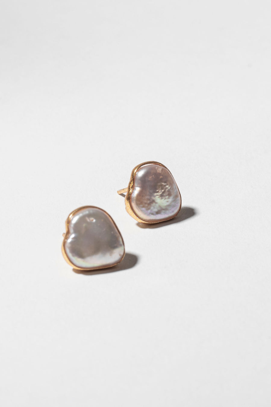 Heart shaped pearl studs