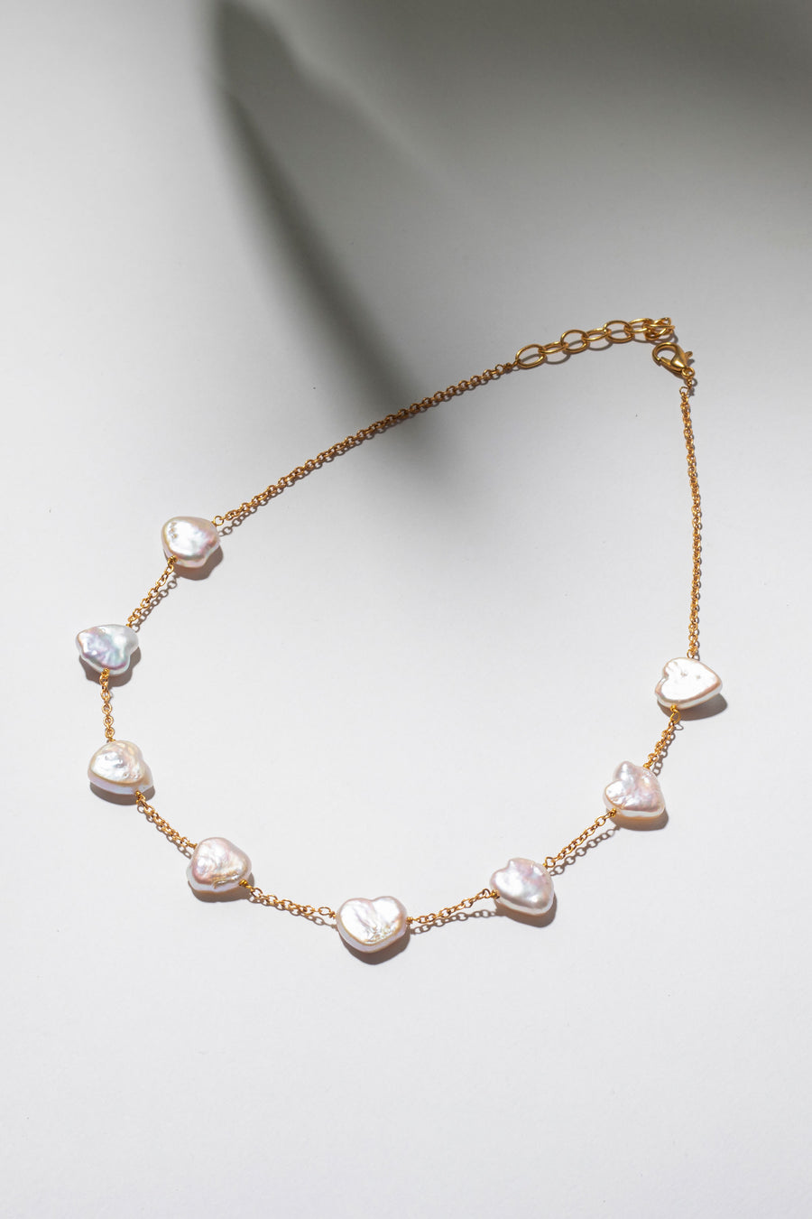 Heart shaped pearl necklace