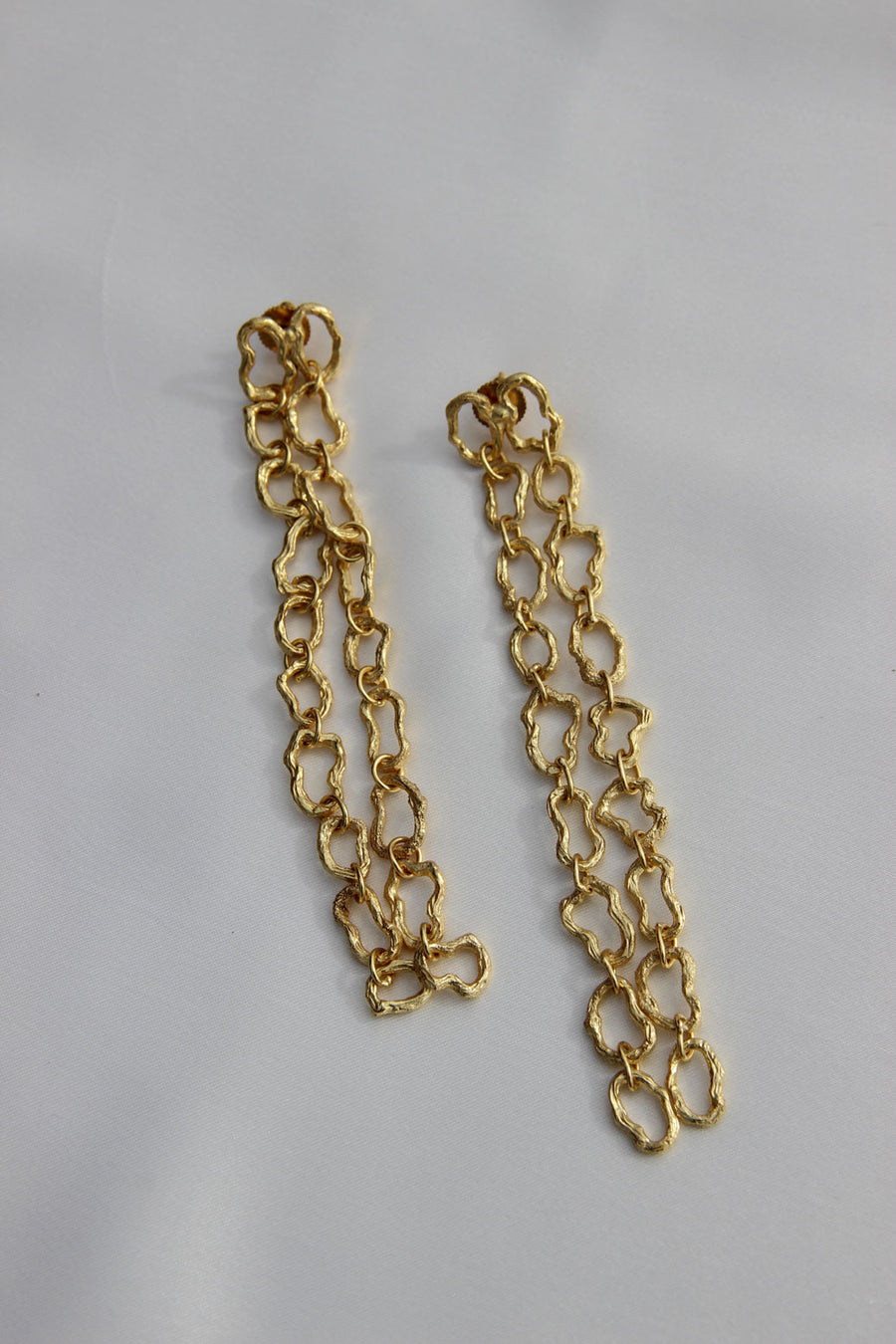 Textured chain shoulder dusters